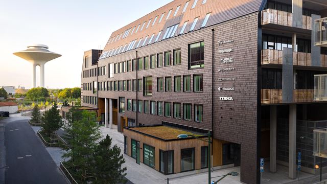 The brick and wood façade of the Origo property